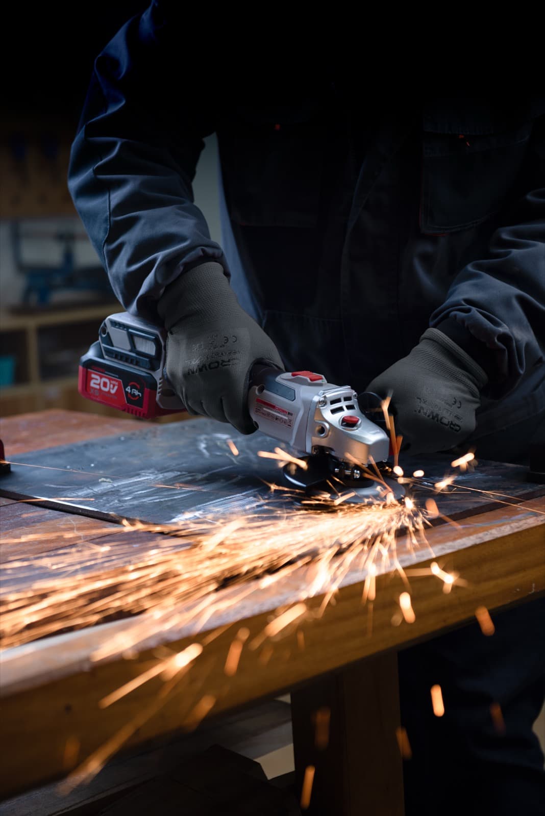 Crown 20V Brushless Angle Grinder — sparks flying cutting metal